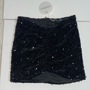 Petite drape front sparkly black mini skirt